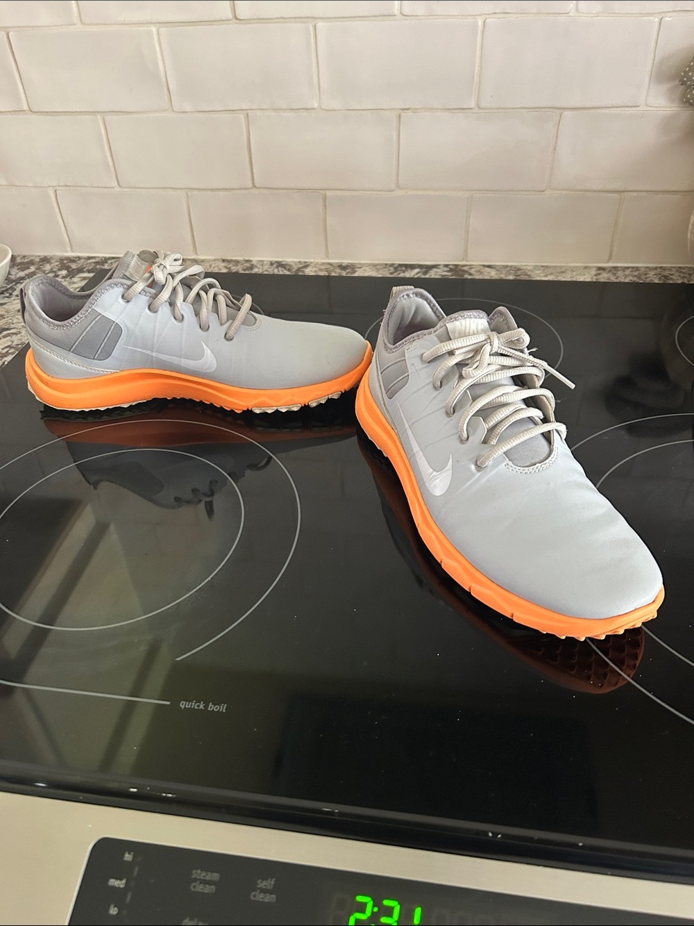 Nike women Light Gray golf Shoes with Orange Outsole